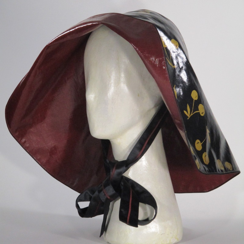 Kopfbedeckung - Damen Regenhut - schwarz gold rot